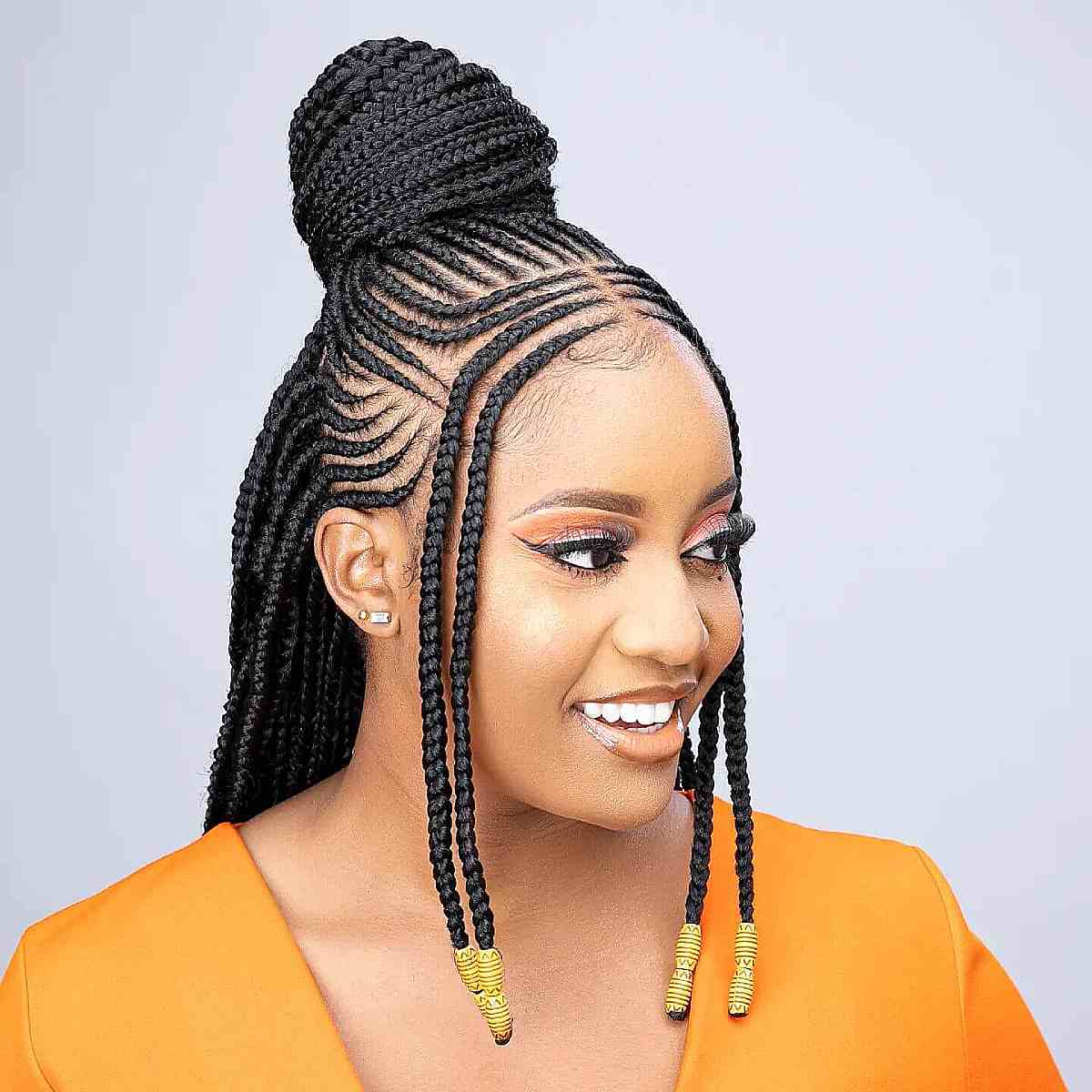 Beautiful Cornrows with a High Bun for Black Women